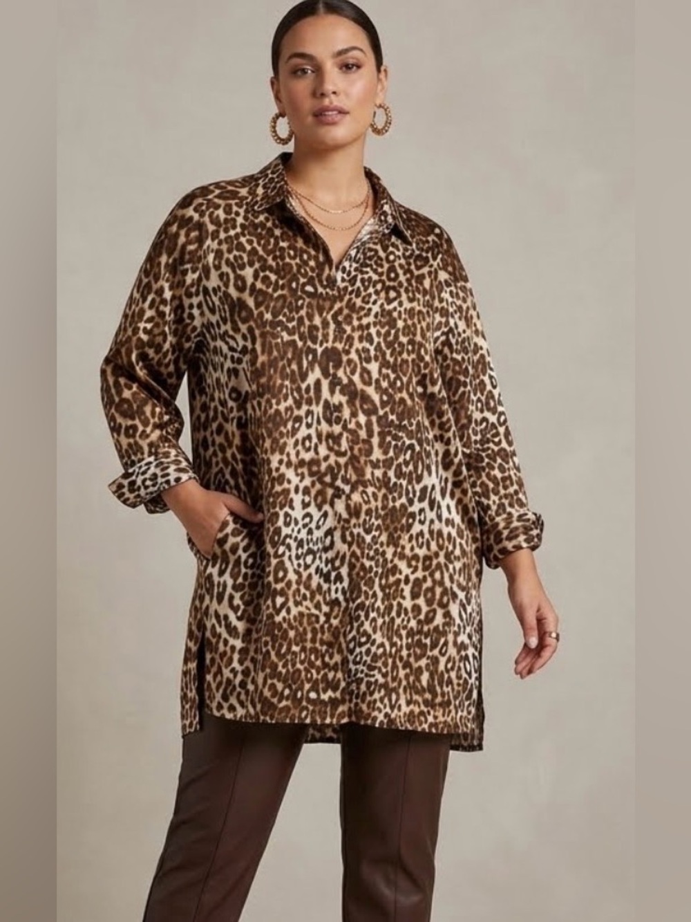 Nice longer length woman button down printed shirt.